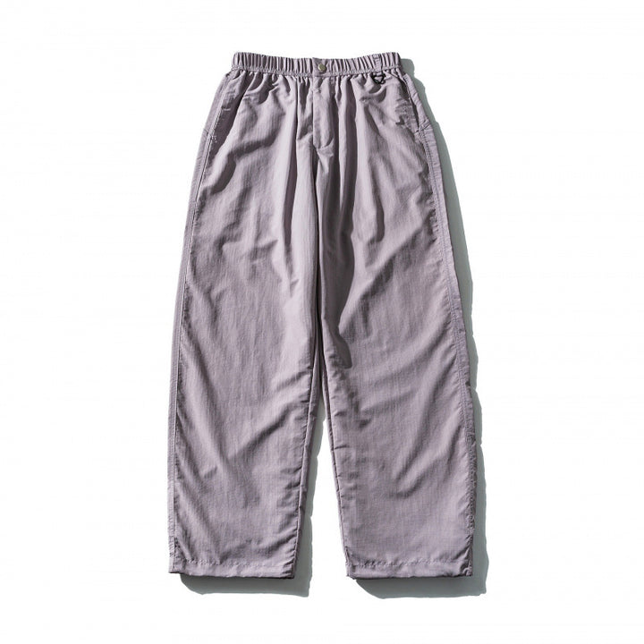 Unisex Loose Crinkle Pants with elastic drawstring waistband, drop-crotch, and side pockets Mune Fashion