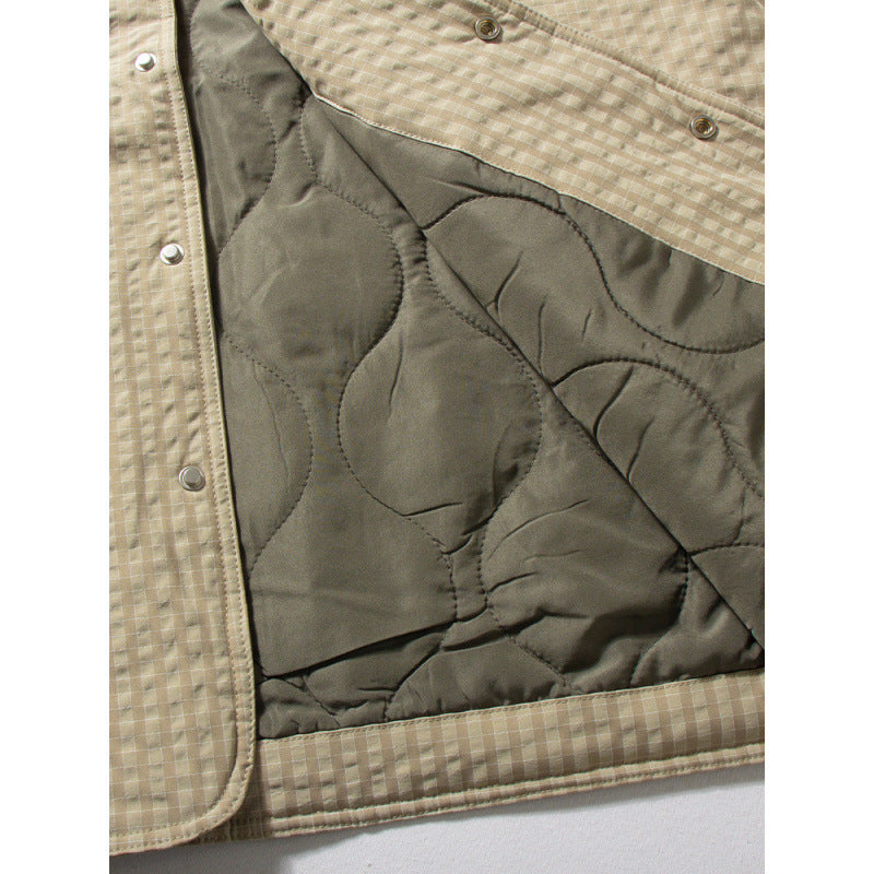 Men's quilted jacket without a collar with snap button closure and side insert pockets Mune Fashion