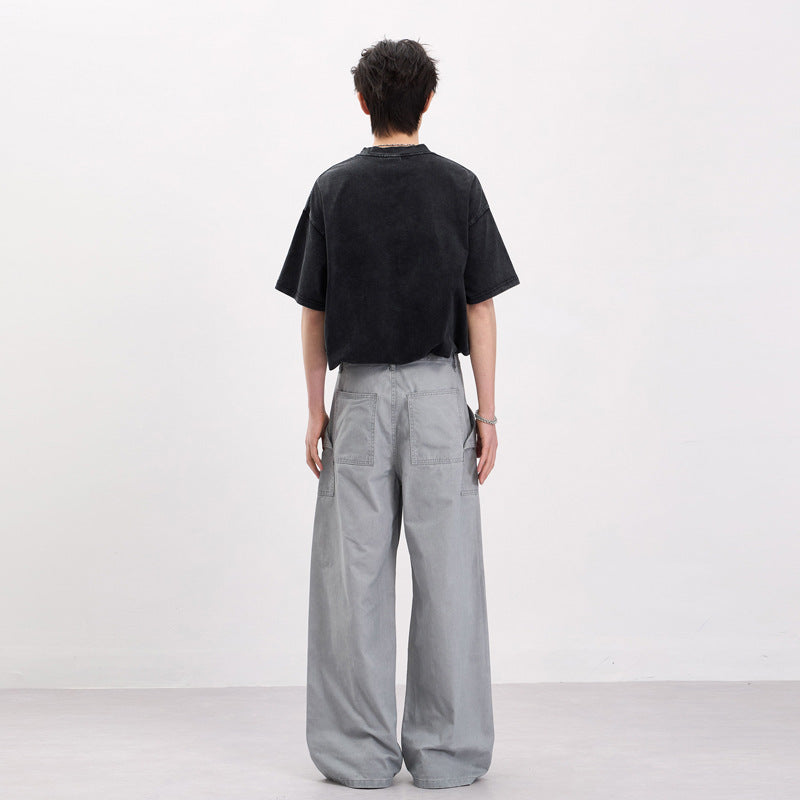 Men's baggy cargo pants in workwear style with large patch pockets and zipper details Mune Fashion