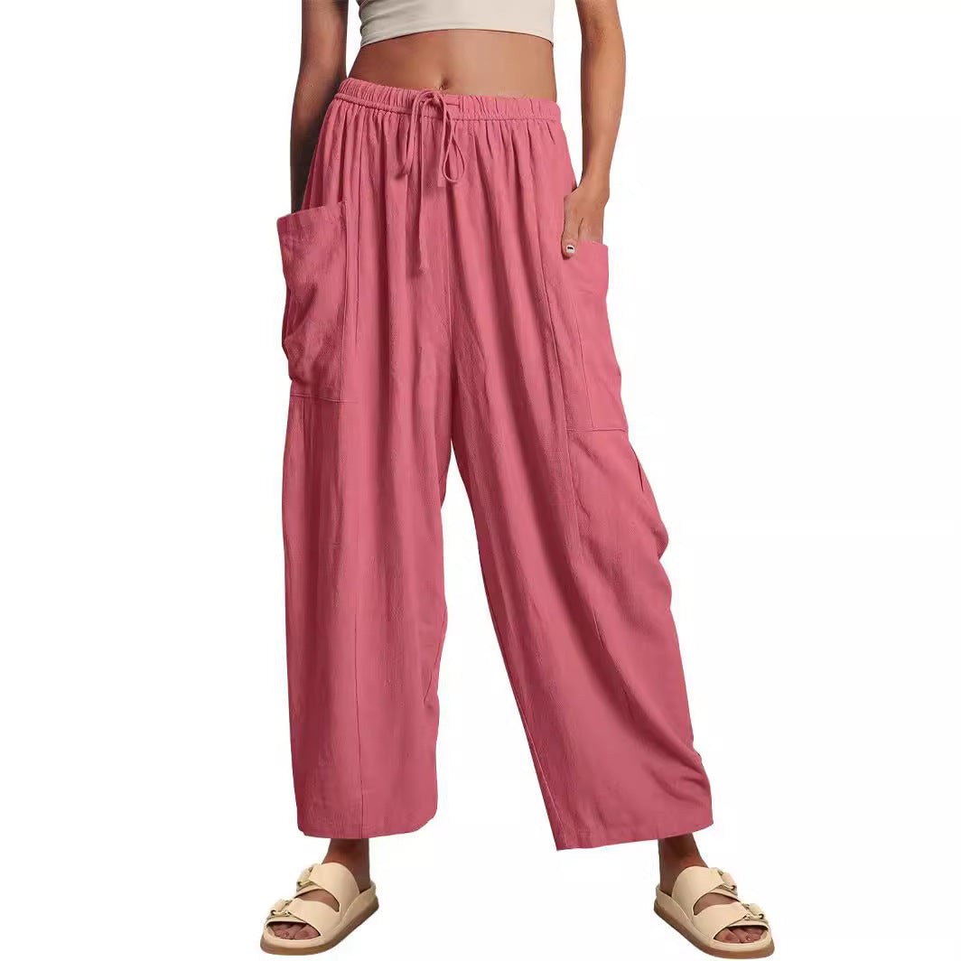Women's wide palazzo pants made from a lightweight linen blend with drawstring and side pocket Mune Fashion