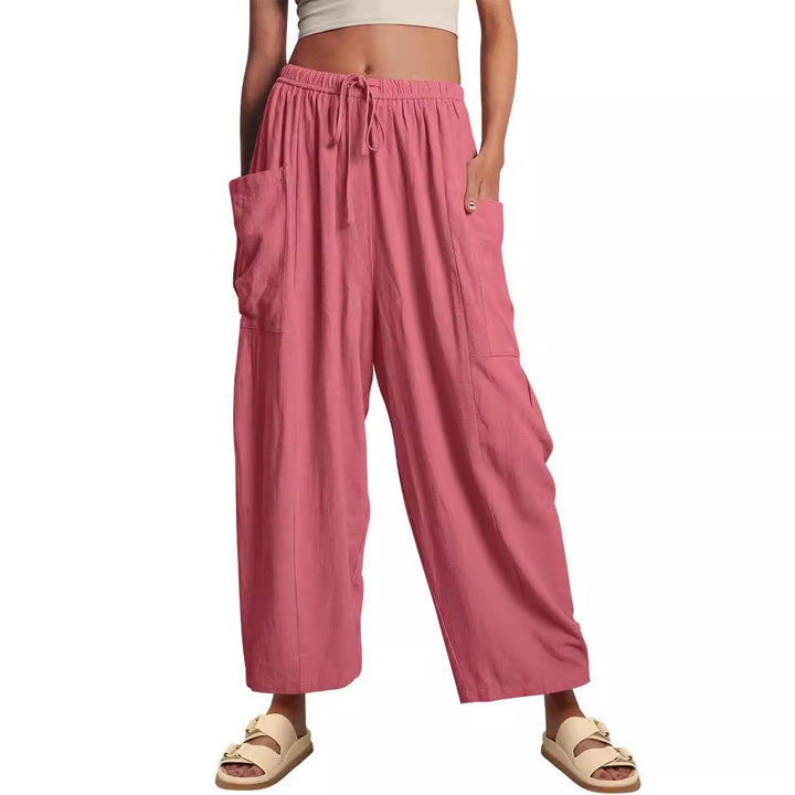 Women's wide palazzo pants made from a lightweight linen blend with drawstring and side pocket Mune Fashion