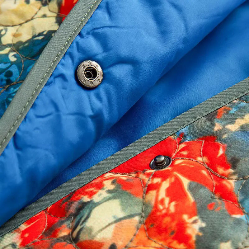 Women's quilted watercolor blouson jacket with cord trim stand-up collar and patch pockets Mune Fashion