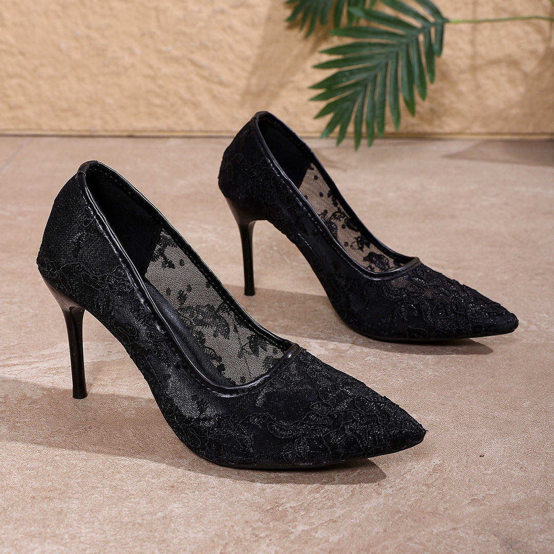 Women’s pointed bridal pumps made of floral lace with transparent mesh and metal stiletto heel