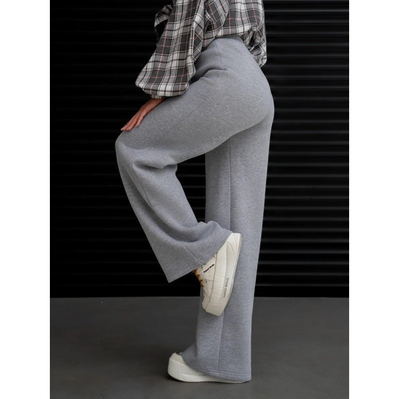 Women's flowing palazzo lounge pants with extra wide leg, elastic comfort waistband, and discreet side pockets Mune Fashion