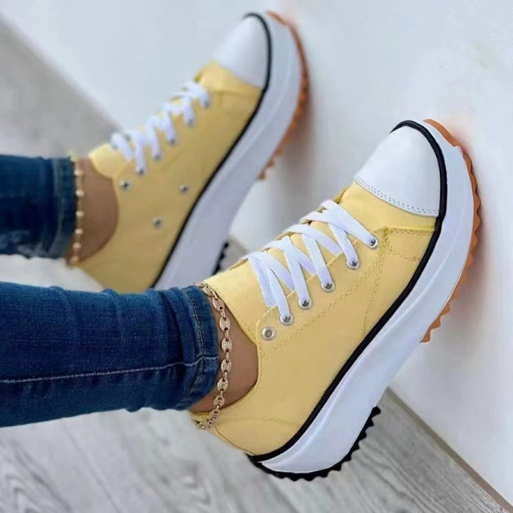 Women’s canvas platform sneaker with robust tread sole, toe cap, and lacing Mune Fashion