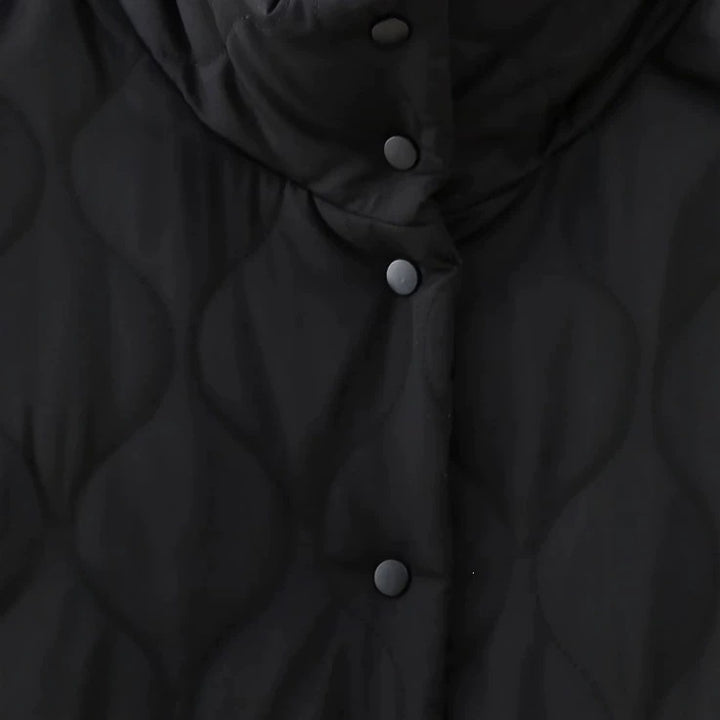 Women’s quilted jacket with stand-up collar and contrasting ruffled pockets Mune Fashion