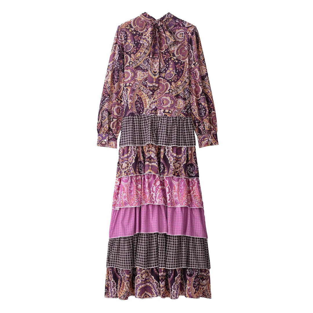 Women's layered maxi dress with paisley patchwork, bow collar, and long cuffed sleeves Mune Fashion