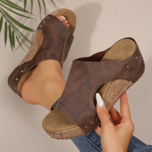 Women’s wedge sandals with heel strap, ergonomic footbed, cork look platform, and padded toe area Mune Fashion