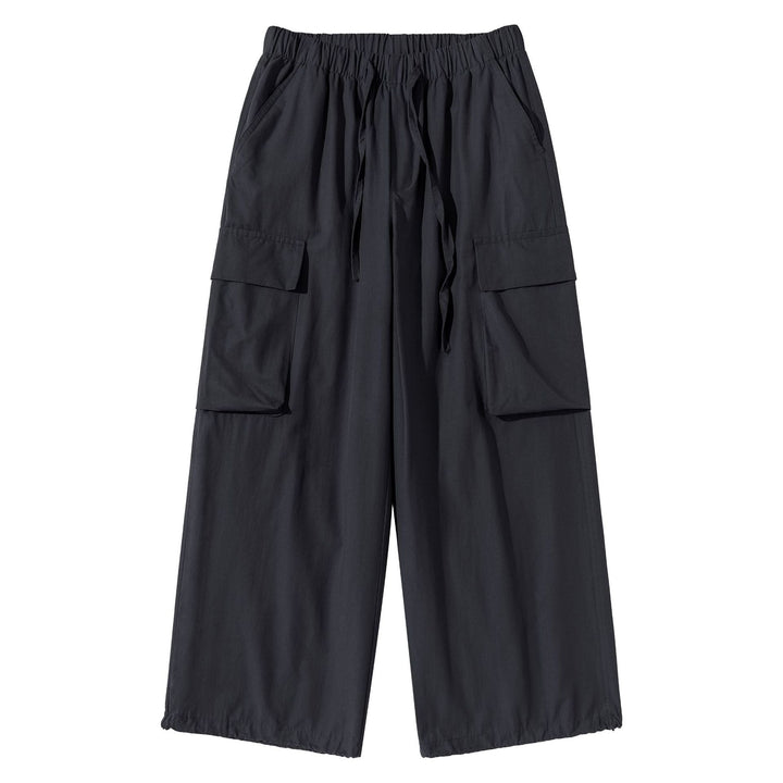 Women's culotte cargo bermudas in utility look with elastic tunnel drawstring waistband and large flap pockets.
