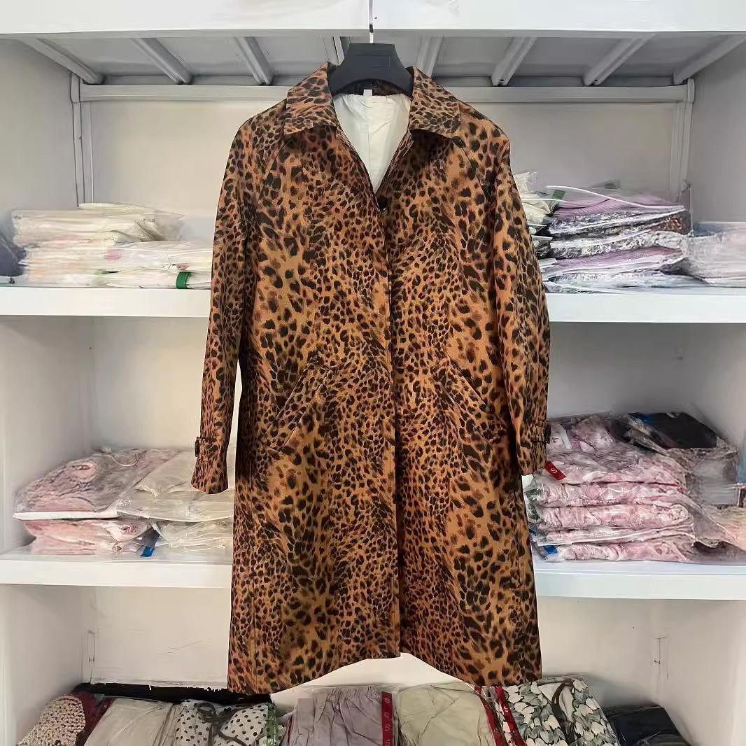 Women's longer satin coat in leopard print with notched collar, concealed button placket, and side pockets Mune Fashion