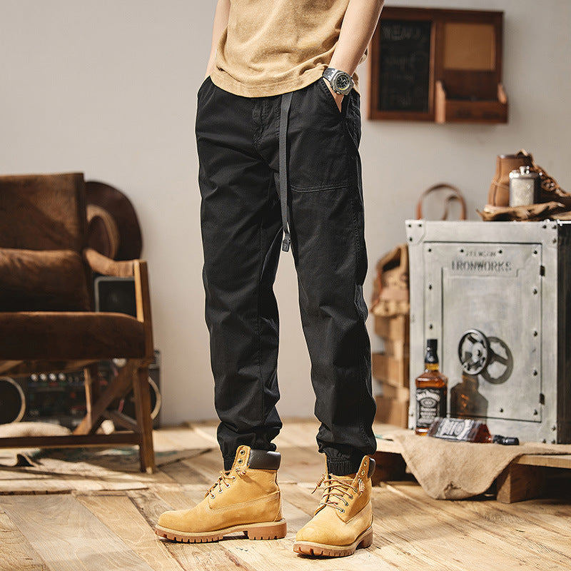 Men's Military-inspired Tapered Cargo Joggers made of durable cotton twill with integrated web belt and ribbed ankle cuffs Mune Fashion
