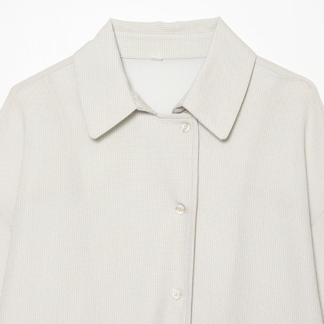 Women's oversized shirt blouse with waffle texture, boxy silhouette, and high-low hem