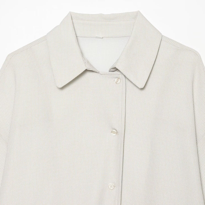 Women's oversized shirt blouse with waffle texture, boxy silhouette, and high-low hem