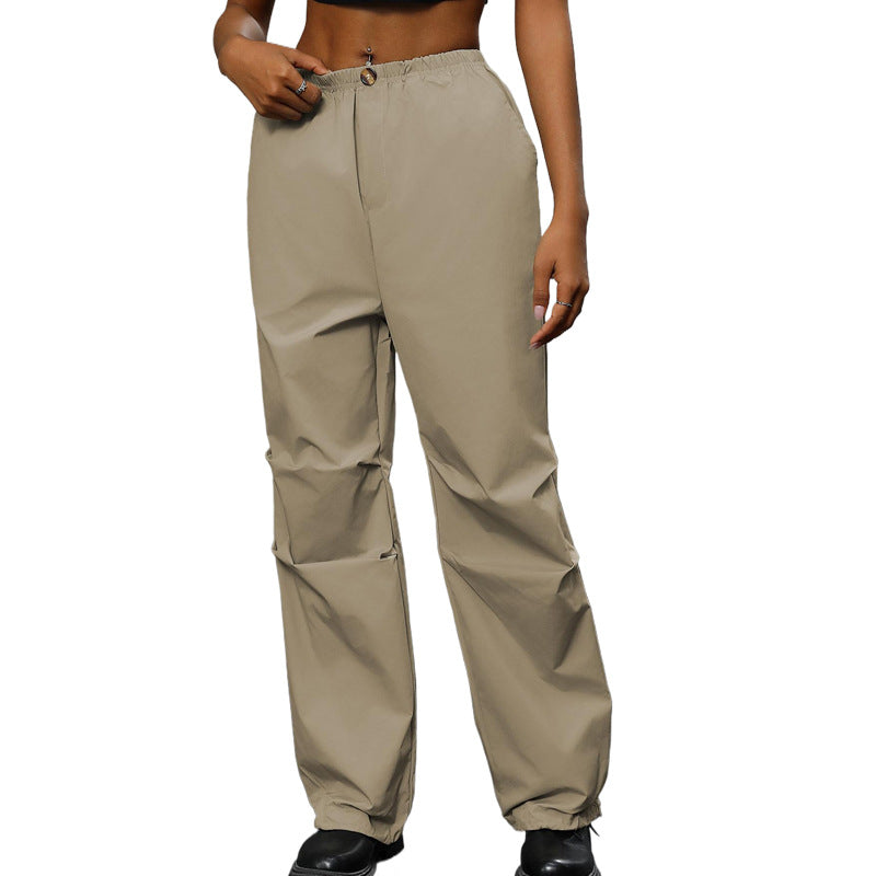 Women's loosely cut utility pants with high elastic waistband, drawstring hem & concealed button placket Mune Fashion
