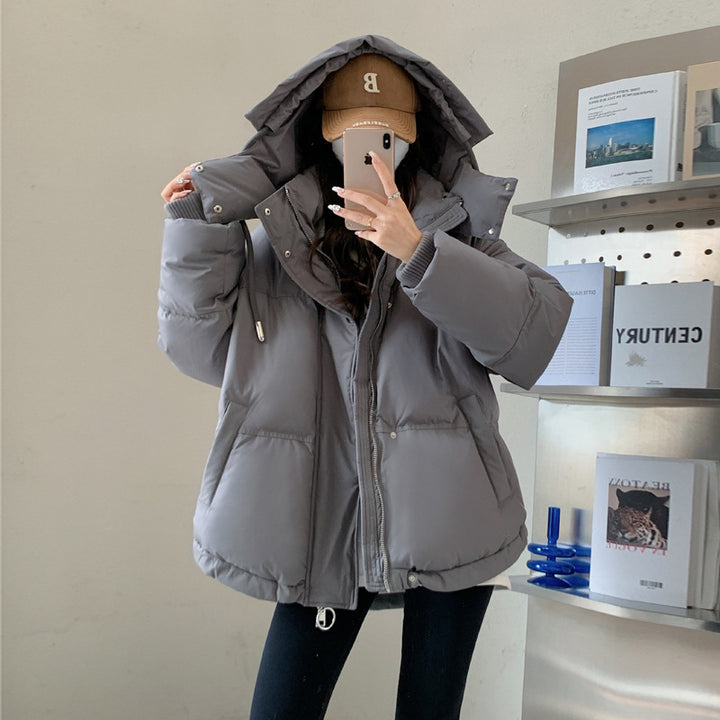 Women's oversized quilted winter jacket with hood and thermal insulation Mune Fashion