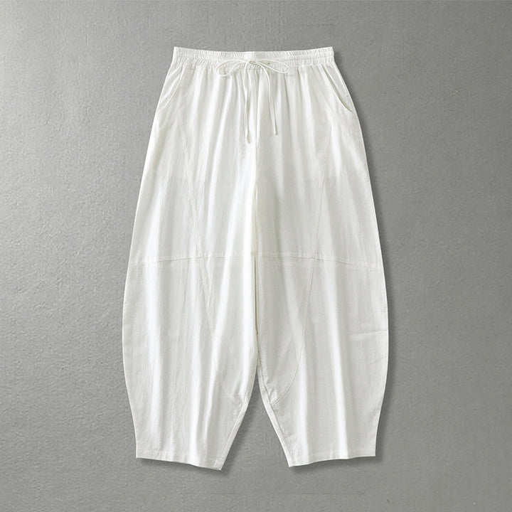 Women's wide harem pants made of lightweight satin with drawstring and side pockets Mune Fashion