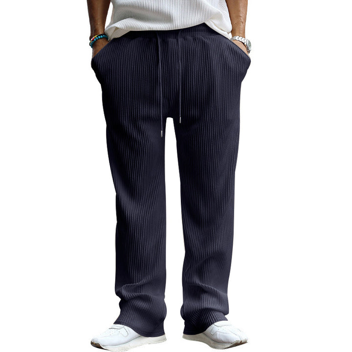 Men's loosely cut pleated trousers with drawstring and wide leg Mune Fashion