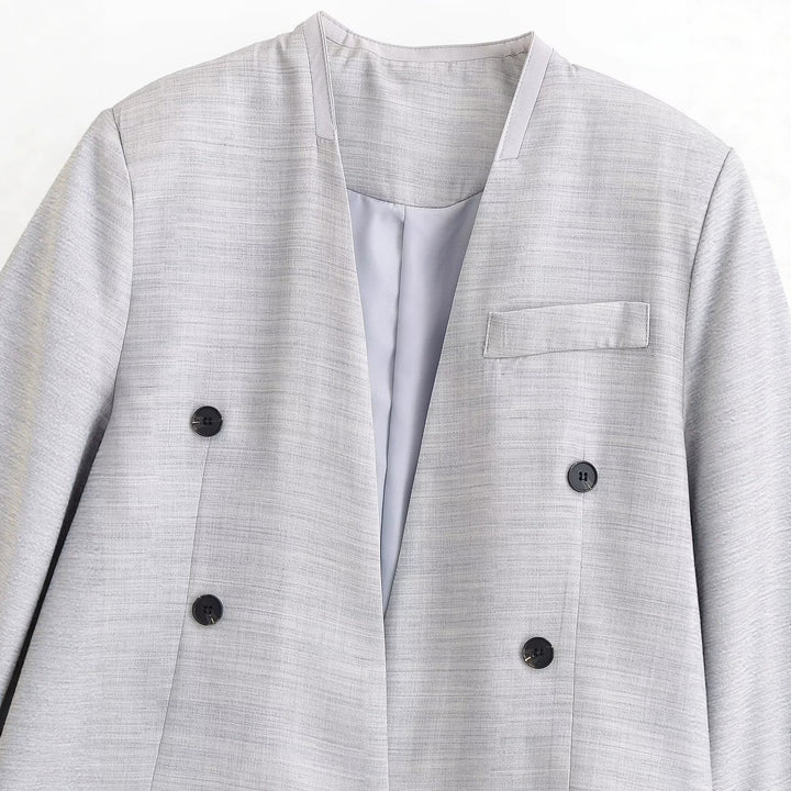 Women's collarless cropped blazer with boxy silhouette and double-button row Mune Fashion