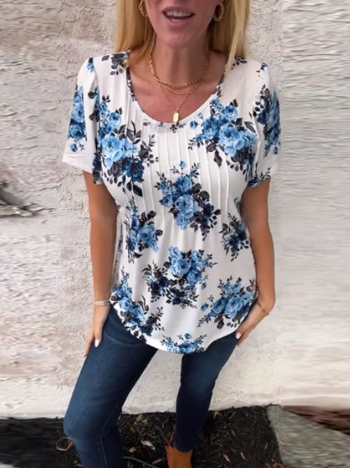 Ladies cropped short sleeve blouse shirt with box pleats and floral print Mune Fashion