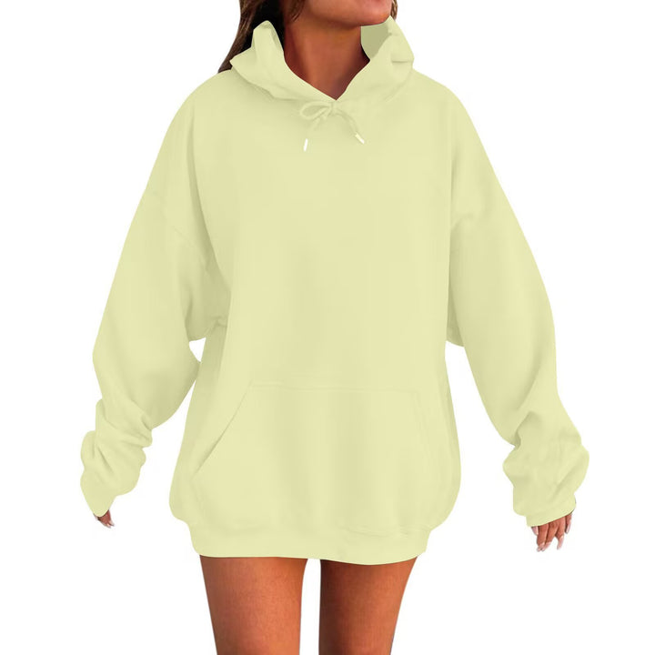 Women’s oversized hoodie dress with kangaroo pocket, extended silhouette and soft French terry Mune Fashion
