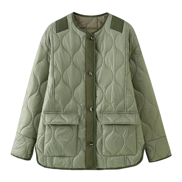 Women's light quilted transitional jacket with organic wave quilting, round neck, dropped shoulders, and flap pockets Mune Fashion