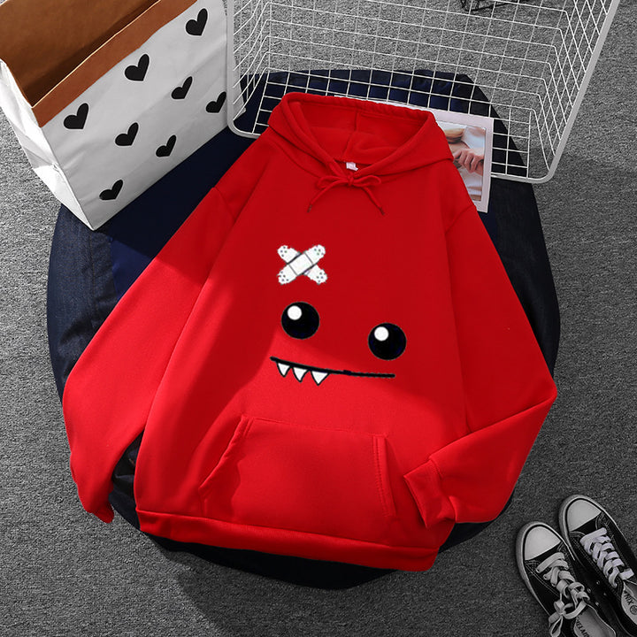 Women's hoodie with playful monster face, bandage application and kangaroo pocket Mune Fashion