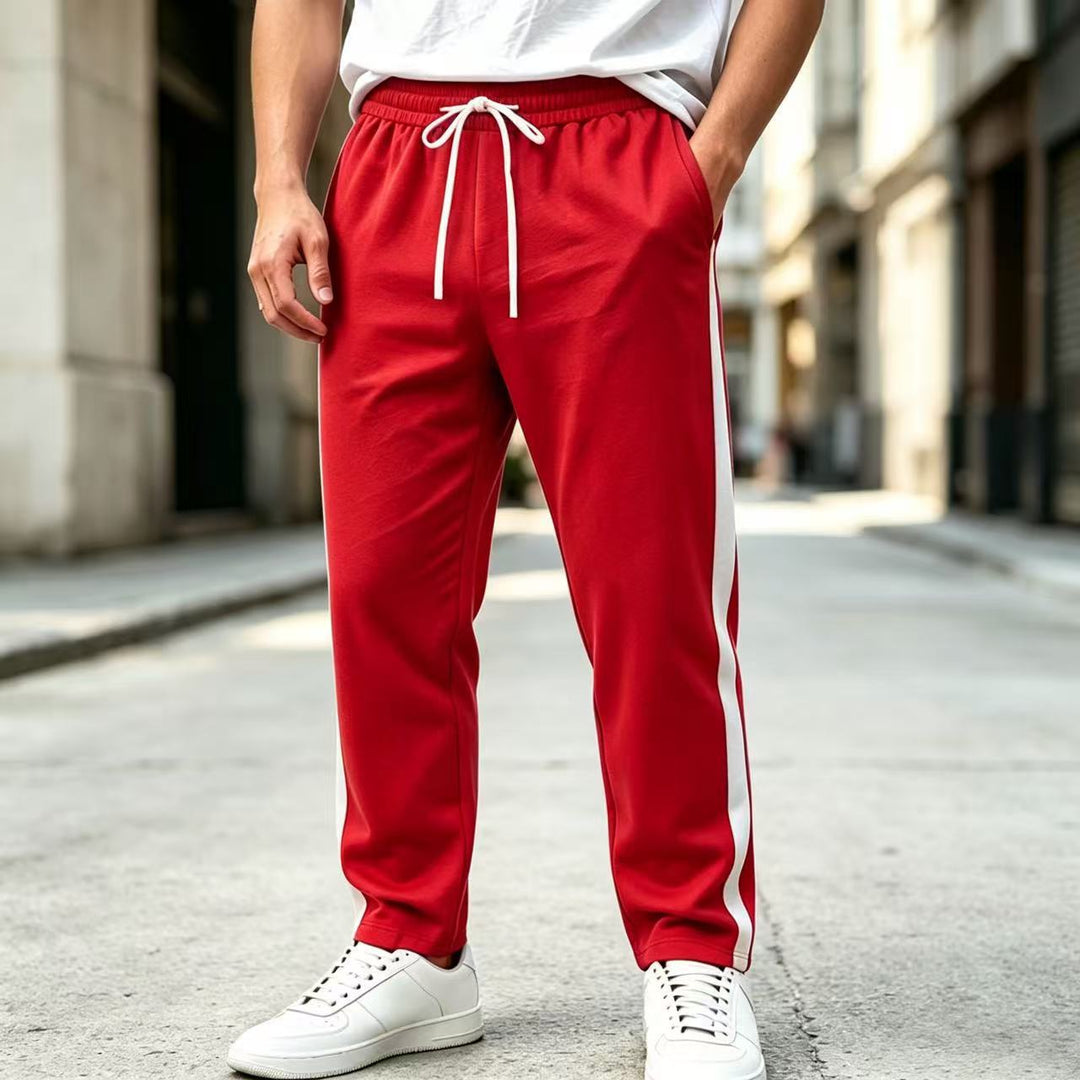 Men's jogging pants with side contrast stripe, elastic waistband and drawstring Mune Fashion