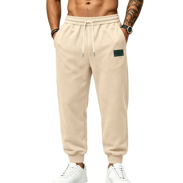Men's casually cut sweat jogging pants with elastic waistband, drawstring, and cuffs Mune Fashion