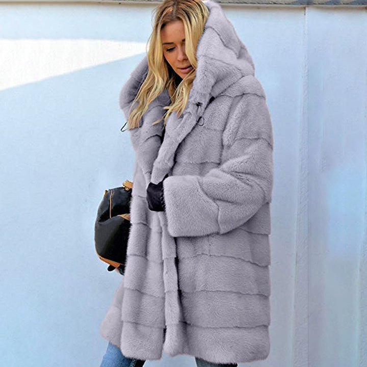 Women's oversized faux fur coat with hood and quilted panel design Mune Fashion