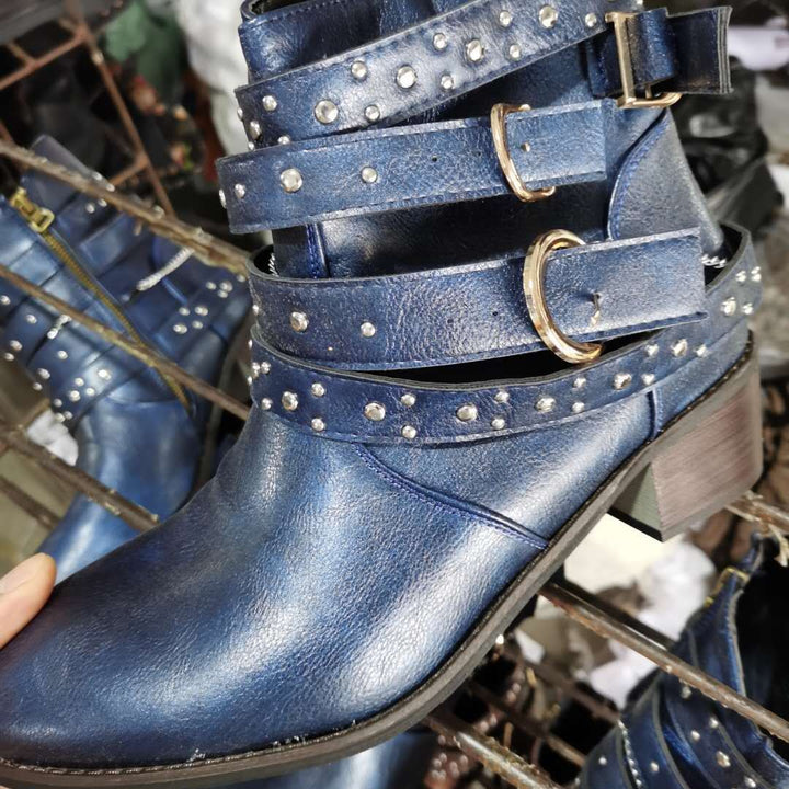 Women ankle-high biker ankle boots with multiple studded straps, decorative chains, and adjustable buckles Mune Fashion