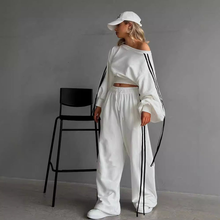 Women's loose Relax leisure pants with drawstring, elastic comfort waistband, and side decorative seams Mune Fashion