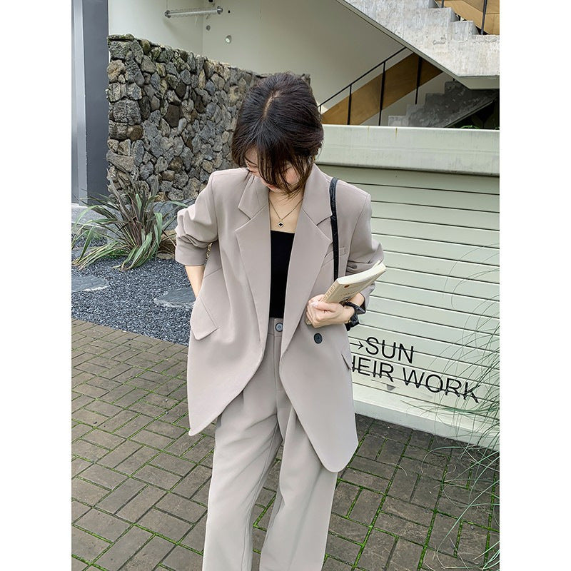 Women's Oversize two-piece made of flowing crepe with lapel blazer and wide pleated trousers Mune Fashion