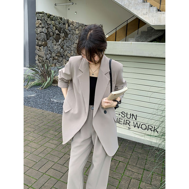 Women's Oversize two-piece made of flowing crepe with lapel blazer and wide pleated trousers Mune Fashion