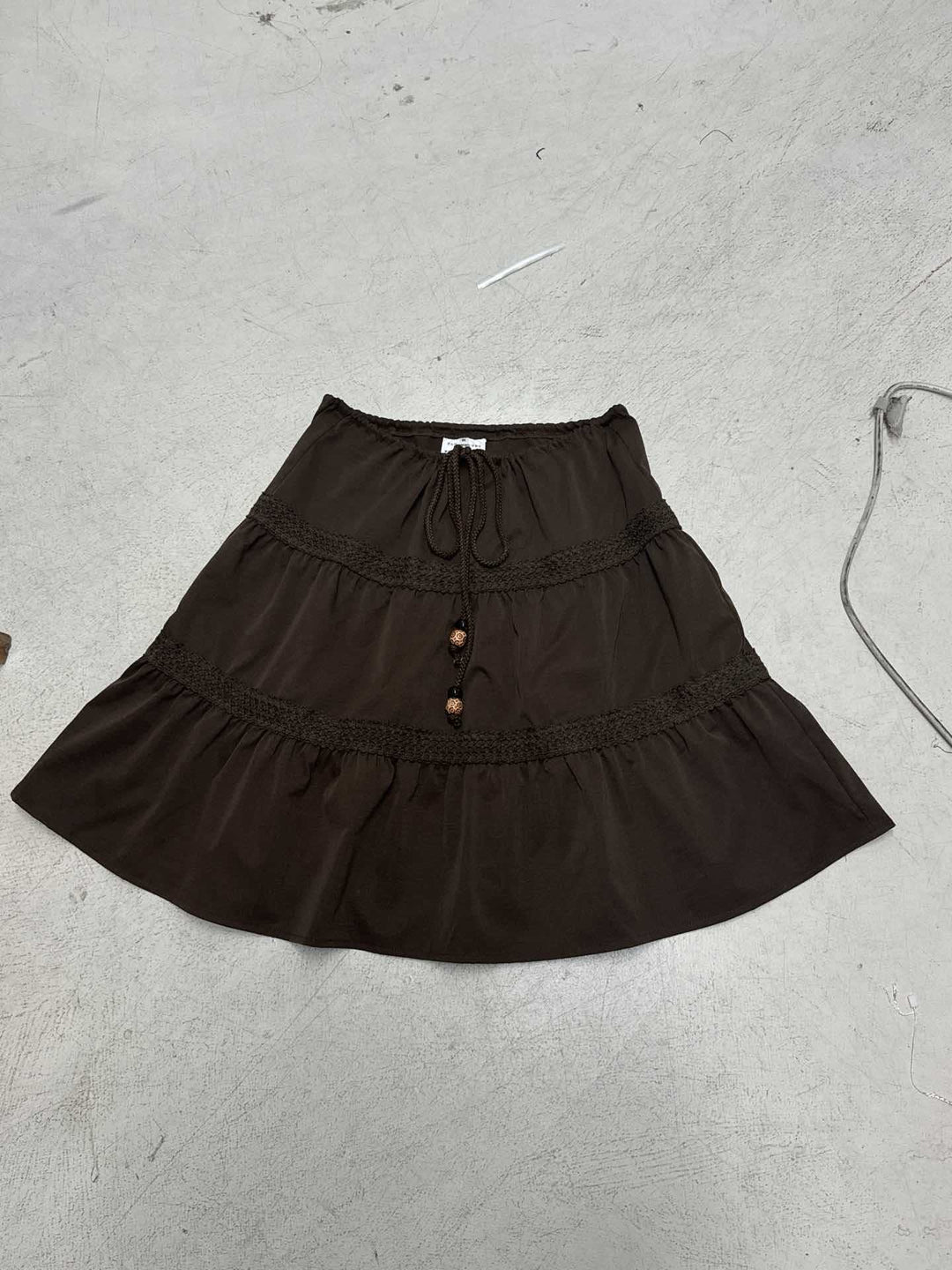 Women’s tiered boho midi skirt with elastic drawstring waistband and crochet band details Mune Fashion