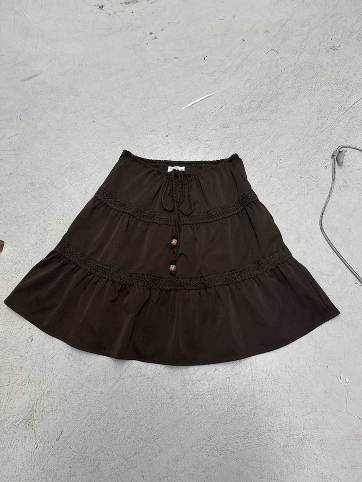 Women’s tiered boho midi skirt with elastic drawstring waistband and crochet band details Mune Fashion