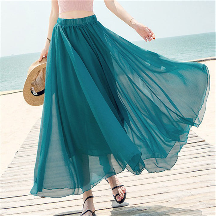 Women's flowing maxi skirt made of chiffon with elastic waistband and layered ruffle Mune Fashion