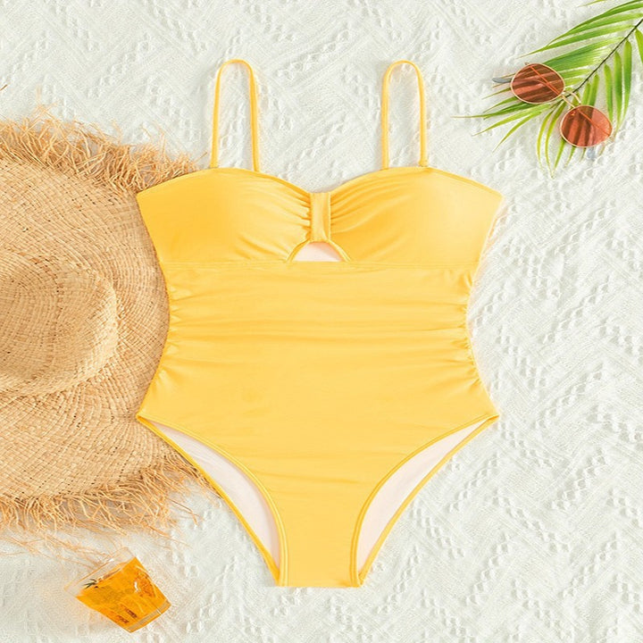 Women's one-piece swimsuit with clever cut-out and flattering ruffle design Mune Fashion