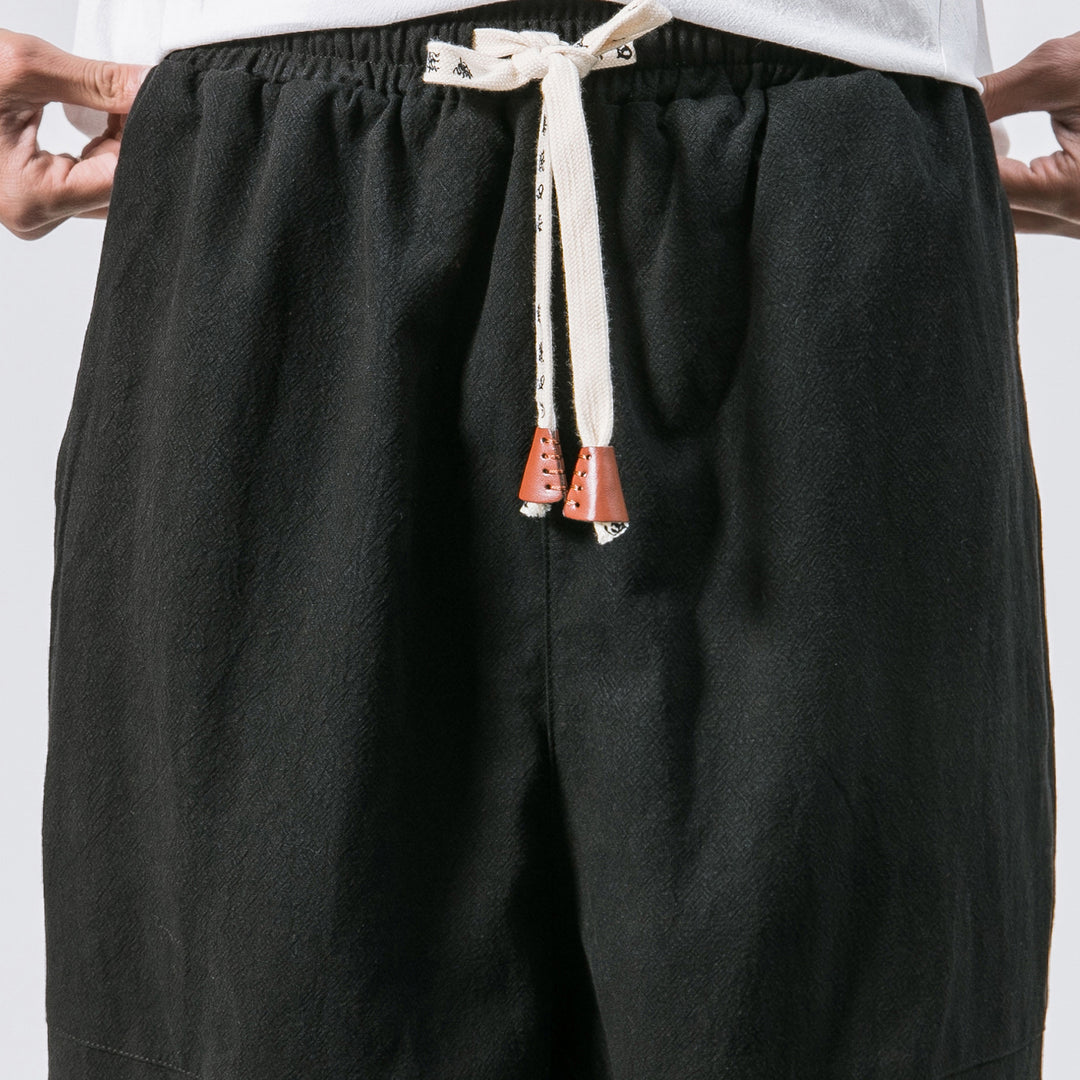 Men's relaxed fit linen joggers with drawstring, inset knee panels, and elastic cuffs Mune Fashion