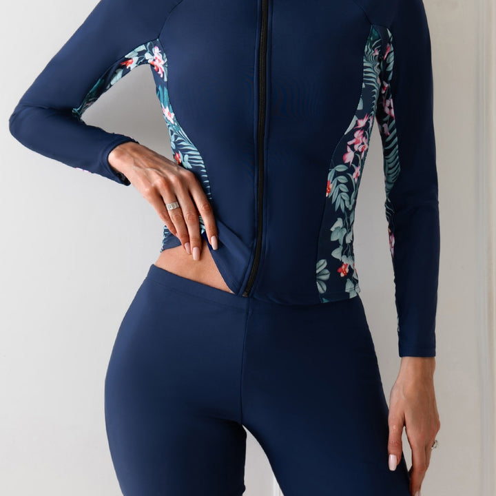 Women’s surf suit with long sleeves and floral accents Mune Fashion