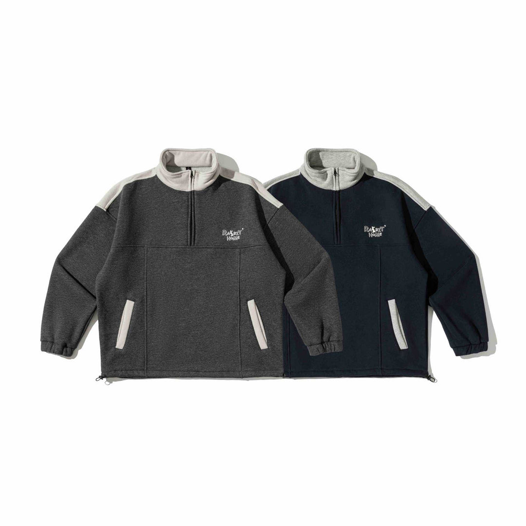 Unisex Half-zip sweatshirt in oversized boxy cut with high stand-up collar and kangaroo pocket Mune Fashion