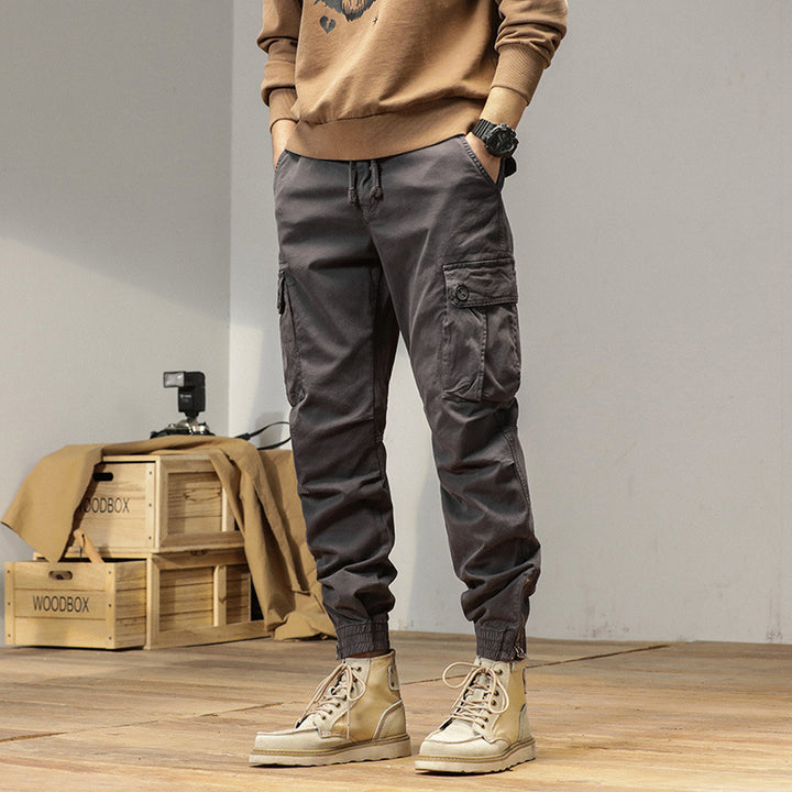 Men's robustly cut canvas cargo jogging pants with drawstring waist, knee patches, and elastic ankle cuffs Mune Fashion