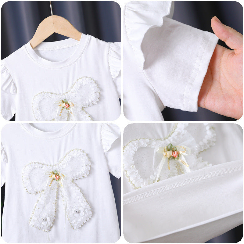 Girls T-shirt with decorative ruffle design and artistic bow motif Mune Fashion