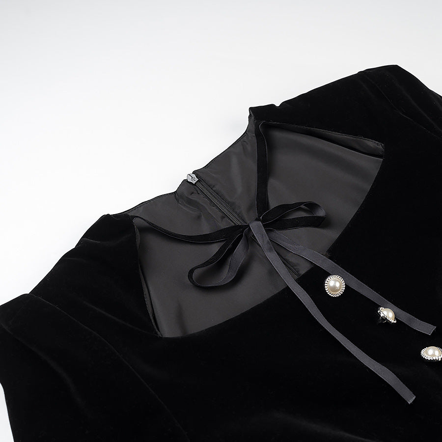 Women’s velvet dress with fitted bodice, puff sleeves, and layered ruffle skirt Mune Fashion