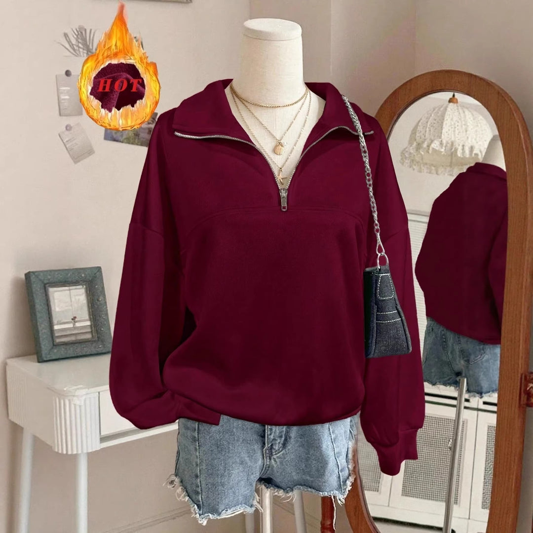 Women's oversized sweatshirt with half zipper, high collar and balloon sleeves Mune Fashion