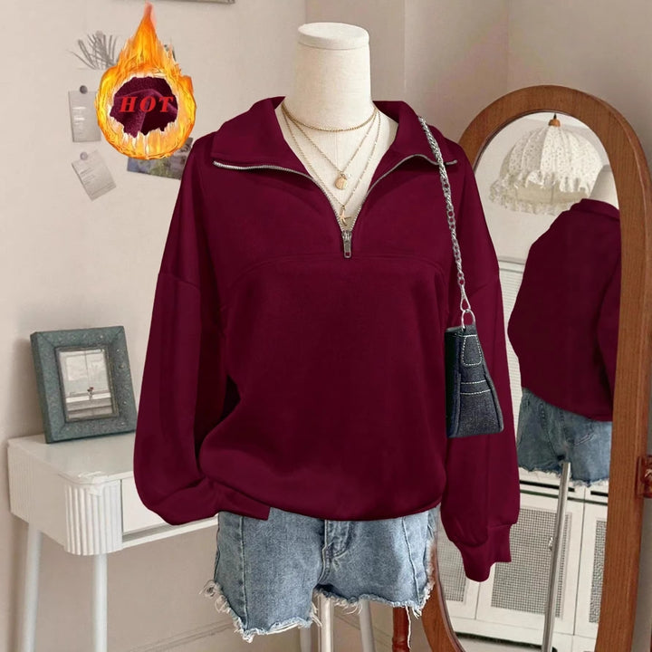 Women's oversized sweatshirt with half zipper, high collar and balloon sleeves Mune Fashion