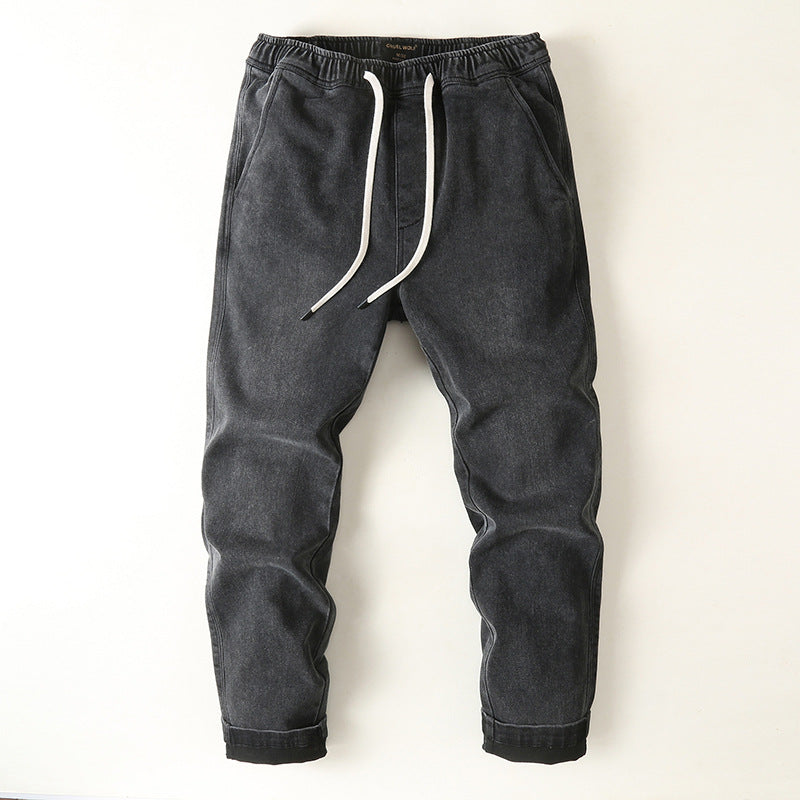 Men's denim joggers with elastic waistband, drawstring, and rolled hem Mune Fashion