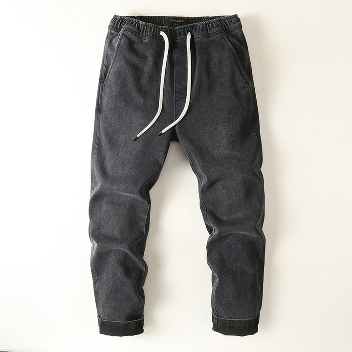 Men's denim joggers with elastic waistband, drawstring, and rolled hem Mune Fashion