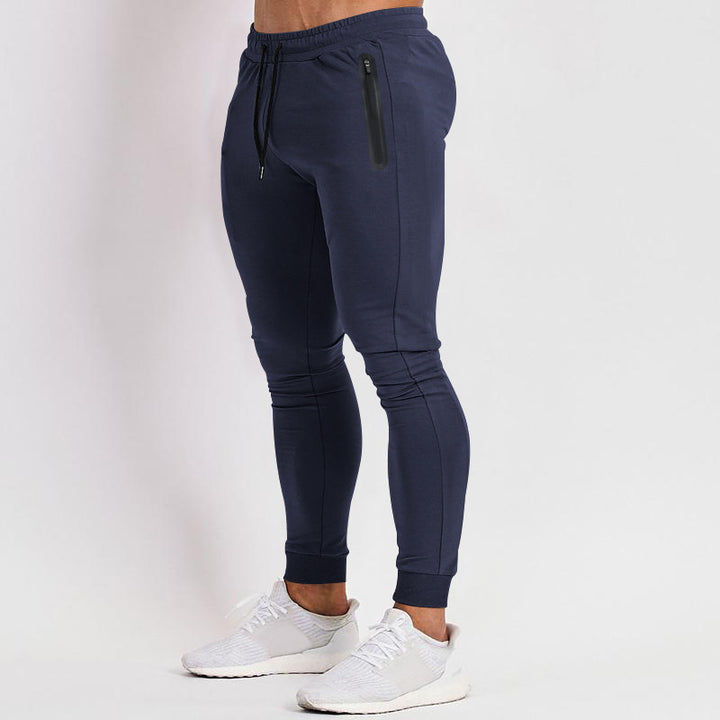 Men's slim-fit jogging pants with zip pockets and drawstring Mune Fashion