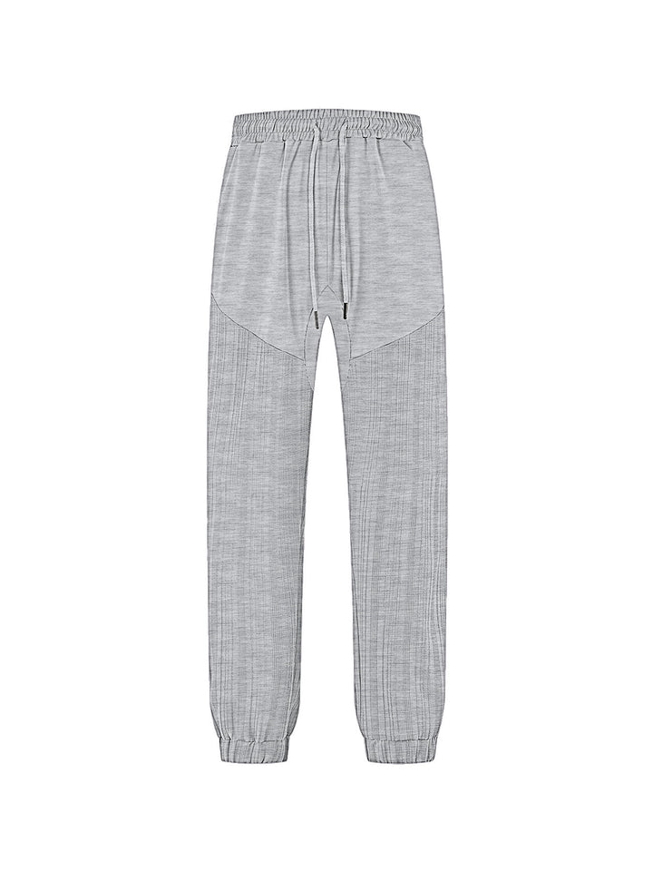 Men's slim-fit jogging pants with elastic drawstring waistband and textured knee panel Mune Fashion