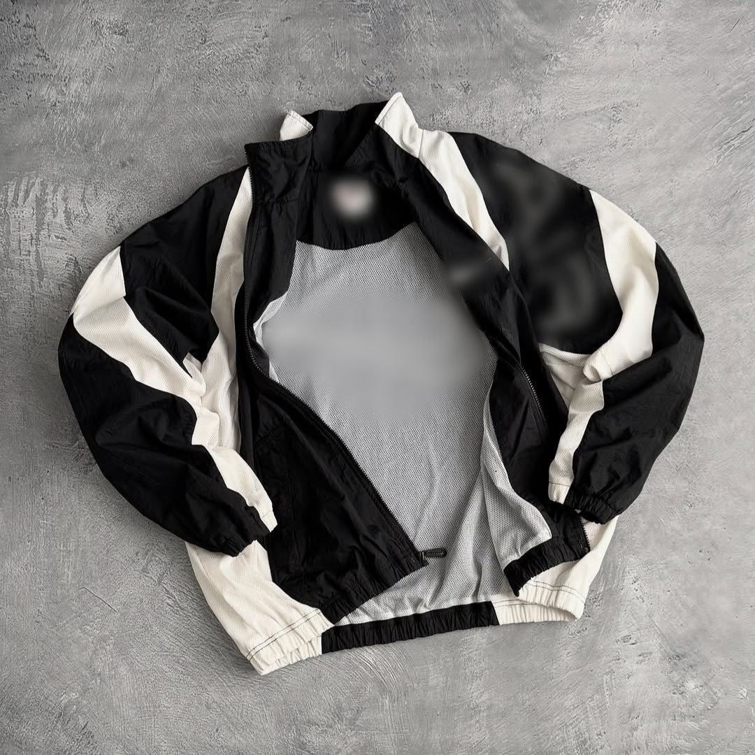 Unisex nan breathable lightweight wind and training jacket with mesh lining, stand collar and elastic hem Mune Fashion